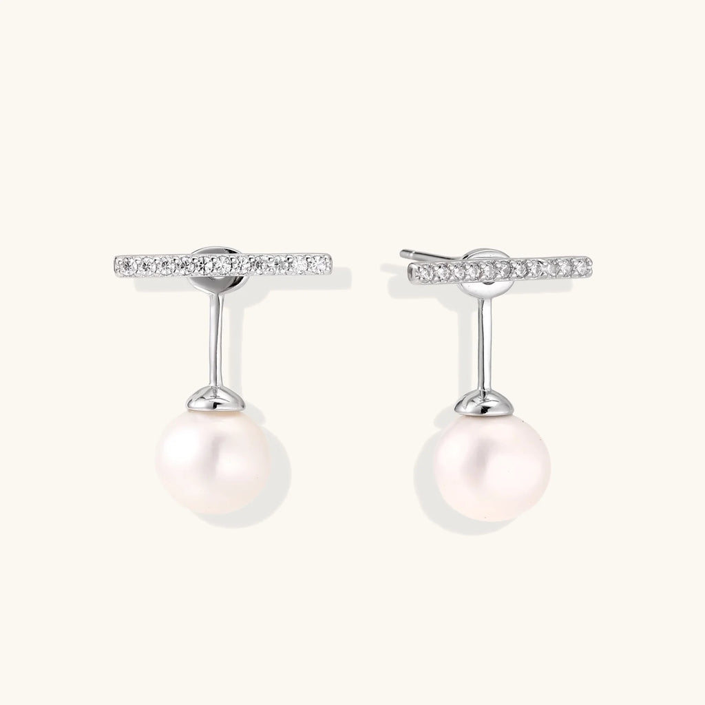 Rhodium-plated sterling silver ear jacket earrings with diamond-set horizontal bar and freshwater pearl drop