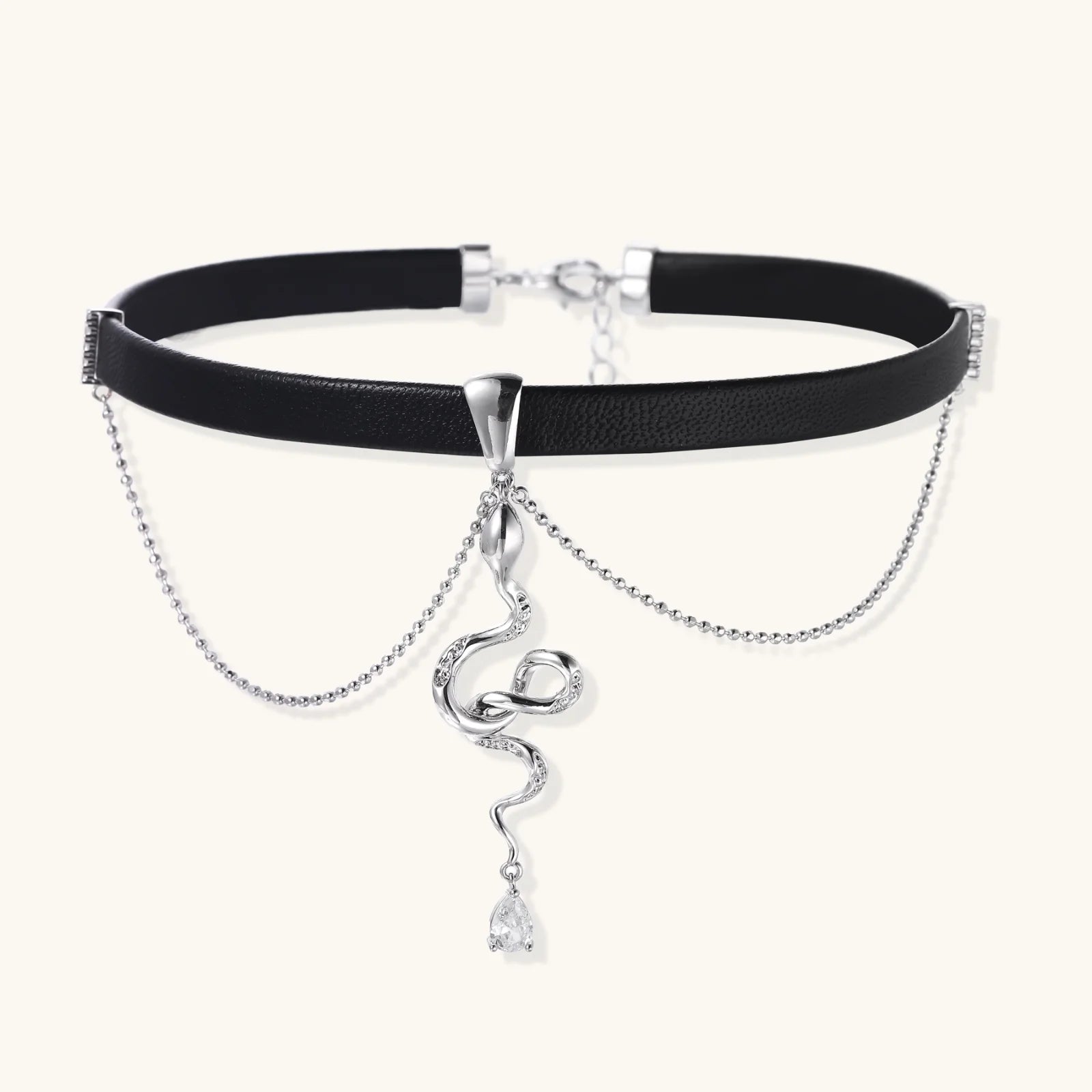 Black leather choker with white gold-plated serpent pendant adorned with zirconia crystals and teardrop charm