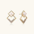 Gold-plated double square frame earrings with freshwater pearl and crystal accents on white background