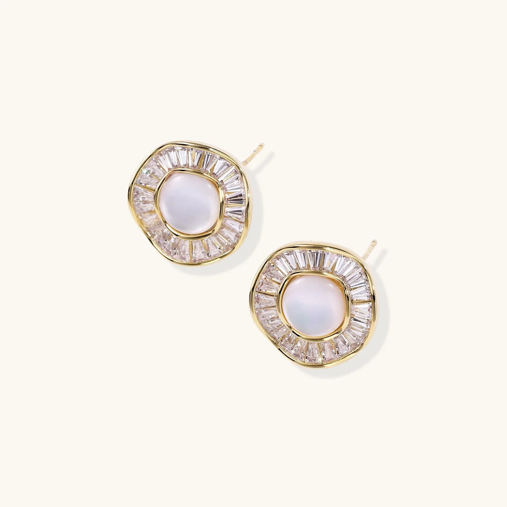 14K gold-plated stud earrings with freshwater pearl center surrounded by baguette-cut crystal halo in sunburst design