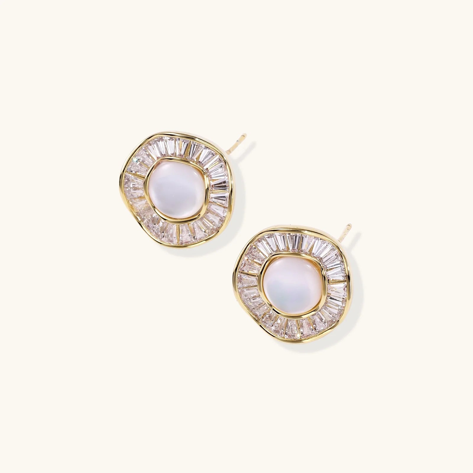 14K gold-plated stud earrings with freshwater pearl center surrounded by baguette-cut crystal halo in sunburst design