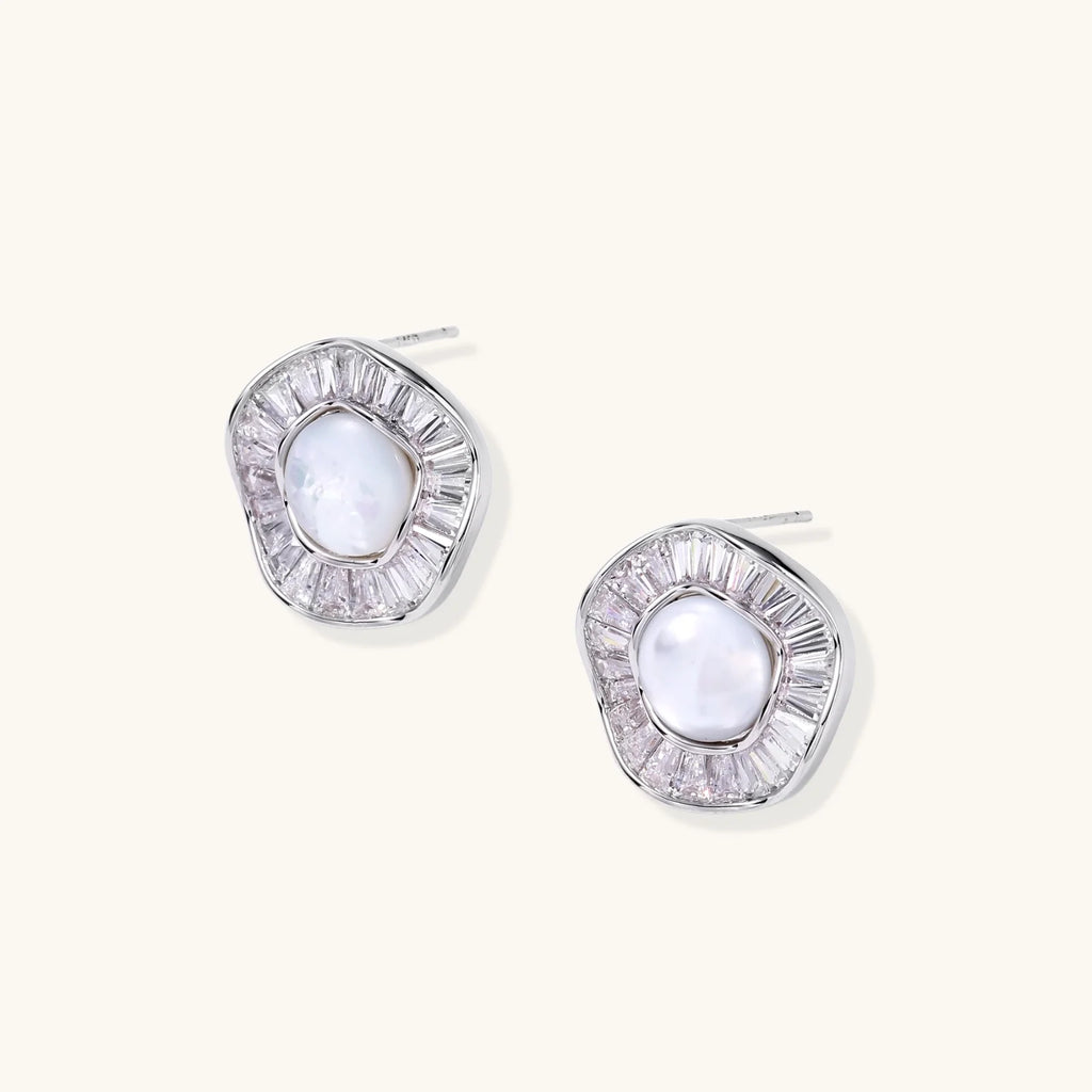 14K gold-plated stud earrings with freshwater pearl center surrounded by baguette-cut crystal halo in sunburst design