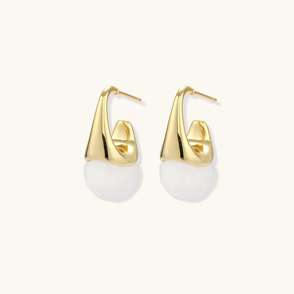 Pair of small gold-plated hoop earrings with triangular cone fronts and curved backs on white background.